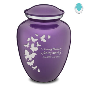 A medium sized Adult Embrace Purple Butterfly Cremation Urn