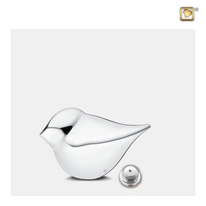 Keepsake Silver SoulBird Shaped Female Cremation Urn with opened cap at the bottom