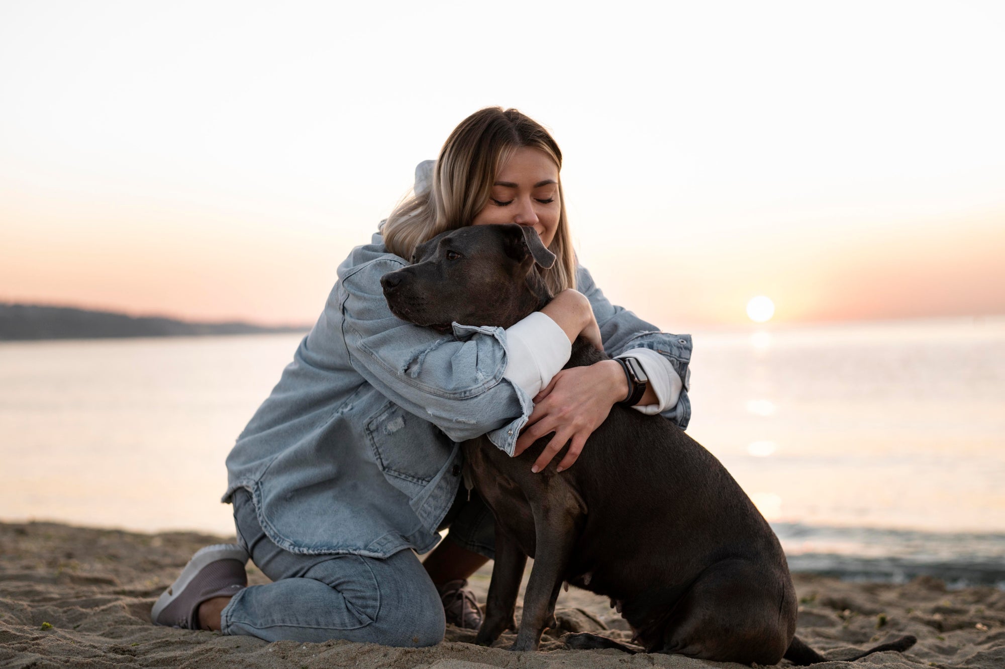 a women loving her beloved pet