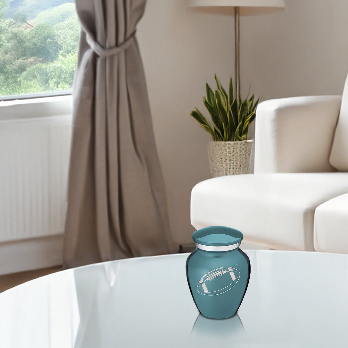 Keepsake Embrace Teal Football Cremation Urn
