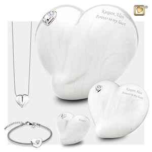 3 Different Sizes of Adult LoveHeart Shaped Pearl Cremation Urns, A Heart shaped cremation pendant necklace and a heart shaped bracelet bead.